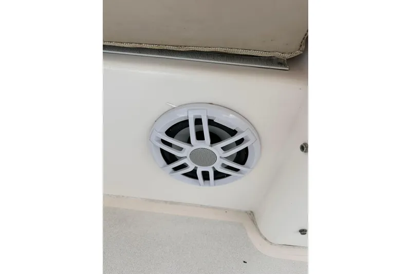 Slide: The Image of Boat speaker on 2007 True North 38 Heritage, white casing, mounted on interior surface. - 43
