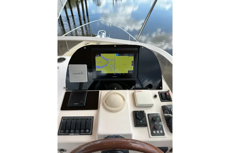 Slide: The Image of Helm of 2007 True North 38 Heritage boat with Garmin navigation system. - 39