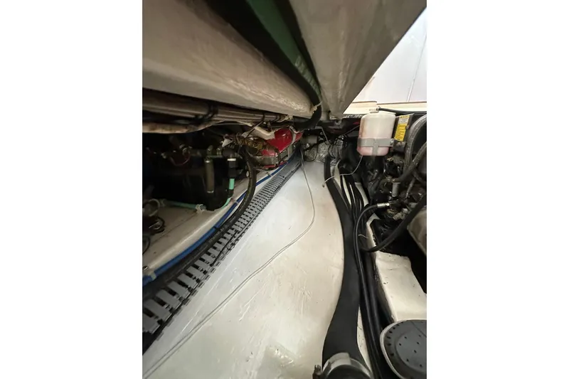 Slide: The Image of Engine compartment of a 2007 True North 38 Heritage boat, showcasing mechanical components. - 103