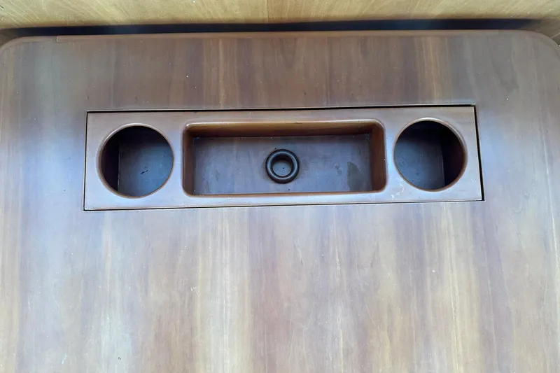 Slide: The Image of Wooden panel with cup holders and storage, True North 38 Heritage, 2007 model. - 111