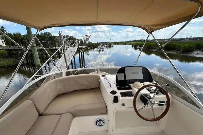 Slide: The Image of Cockpit view of 2007 True North 38 Heritage boat with Garmin navigation system. - 47