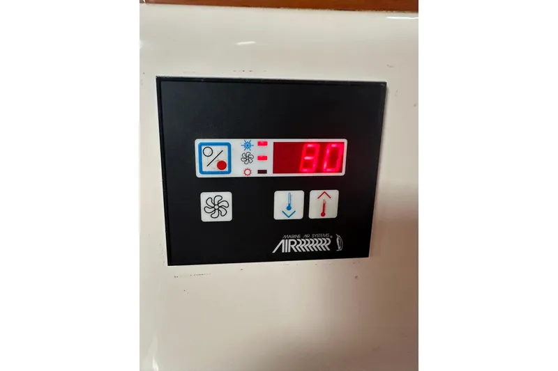 Slide: The Image of Control panel of a 2007 True North 38 Heritage boat, displaying temperature settings. - 118