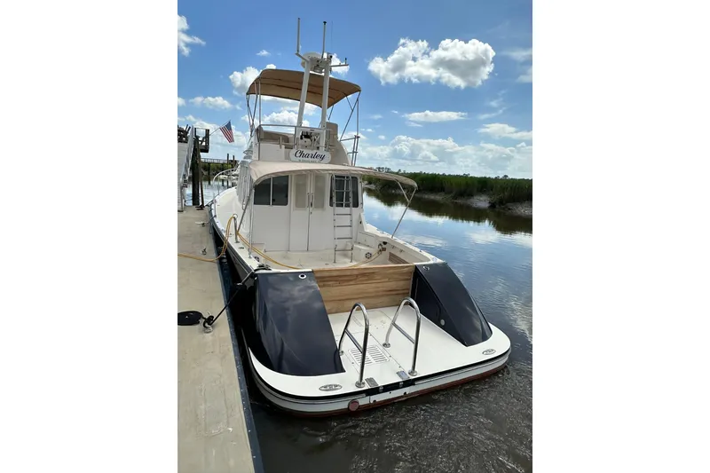 Slide: The Image of 2007 True North 38 Heritage boat docked on a sunny day with clear skies. - 13
