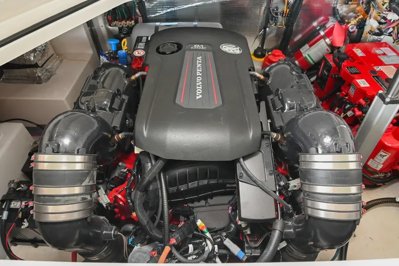 Slide: The Image of Engine compartment of 2025 Regal 28 Express boat featuring Volvo Penta engine. - 56