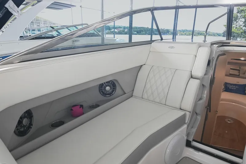 Slide: The Image of 2025 Regal 28 Express boat interior with luxurious seating and modern design. - 23