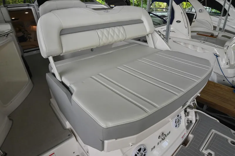 Slide: The Image of 2025 Regal 28 Express boat interior with luxurious seating and modern design. - 9