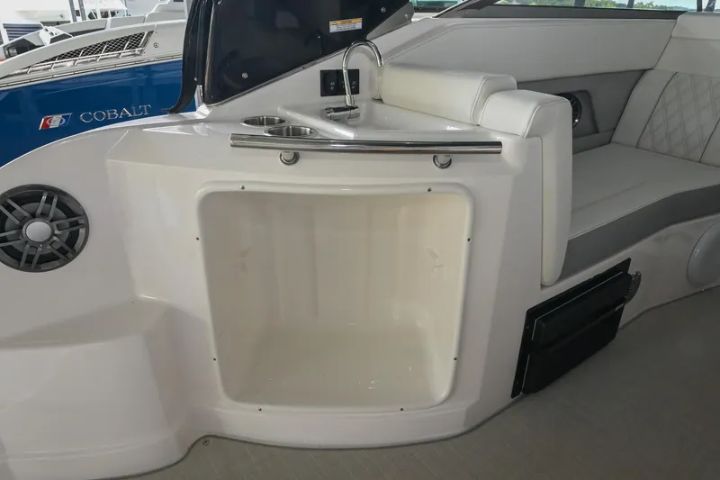 Slide: The Image of Interior of 2025 Regal 28 Express boat with seating and storage area. - 19