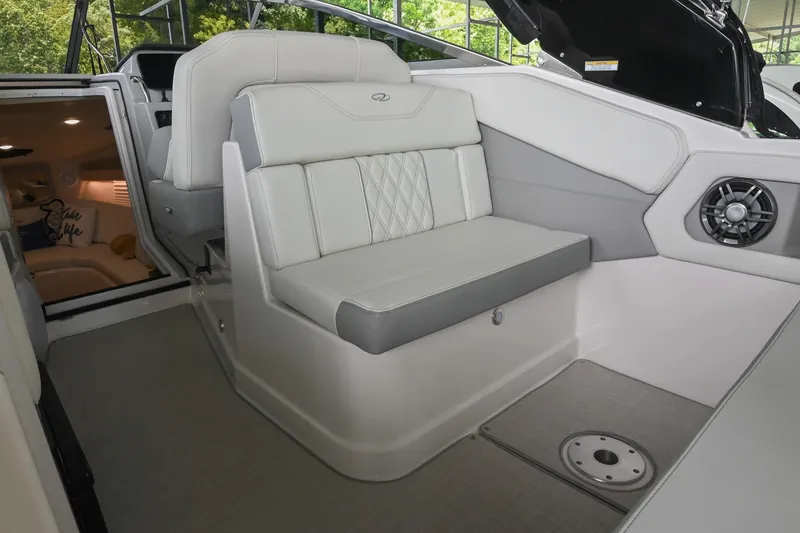 Slide: The Image of 2025 Regal 28 Express boat interior with luxurious seating and modern design. - 17