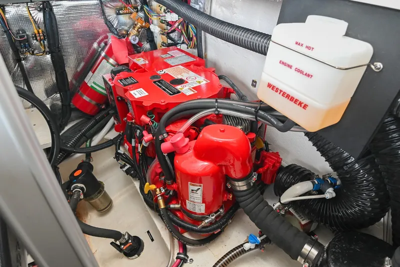 Slide: The Image of Engine compartment of 2025 Regal 28 Express boat with Westerbeke components. - 57
