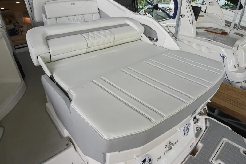 Slide: The Image of 2025 Regal 28 Express boat with luxurious white seating and modern design. - 11