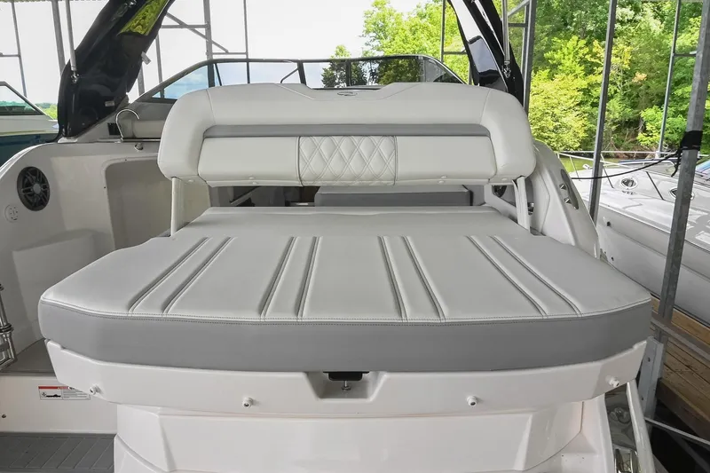 Slide: The Image of 2025 Regal 28 Express boat interior with luxurious seating and modern design. - 10