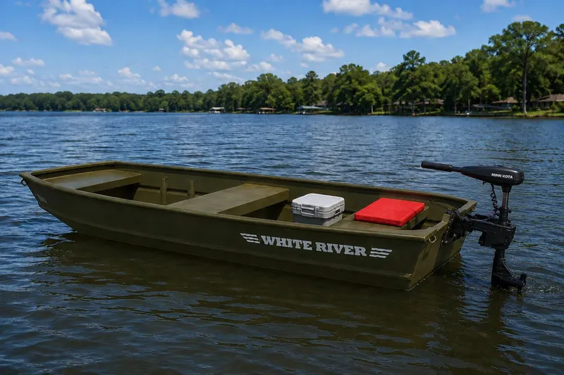 The Image of 2025 White River 1436 Topper boat on a serene lake with clear skies. - 1