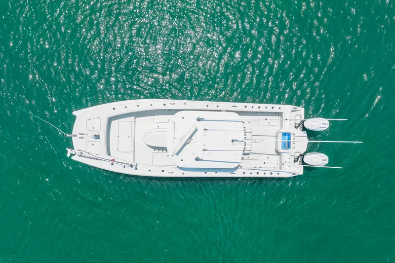 Slide: The Image of Aerial view of 2024 Freeman 34VH boat on turquoise water. - 13