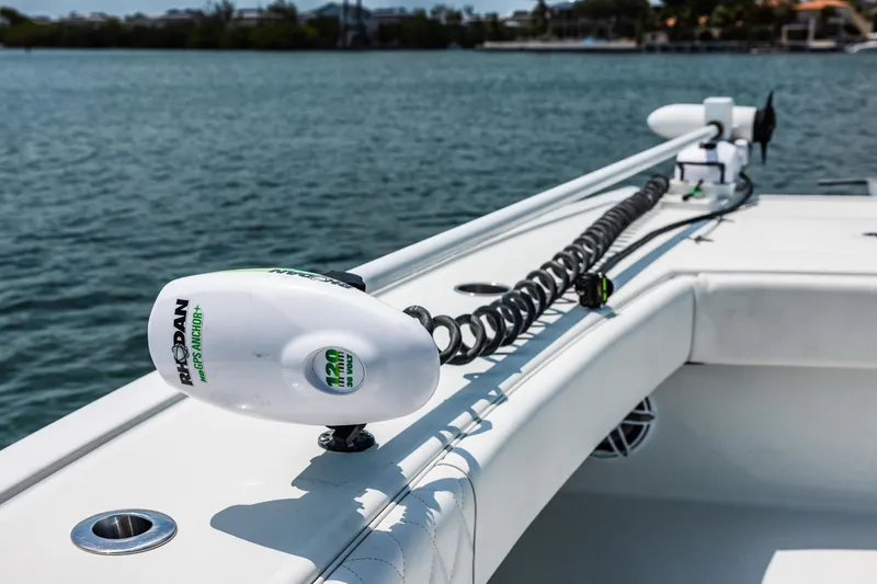 Slide: The Image of Freeman 34VH 2024 boat with Rhodan GPS Anchor system on deck, near water. - 33