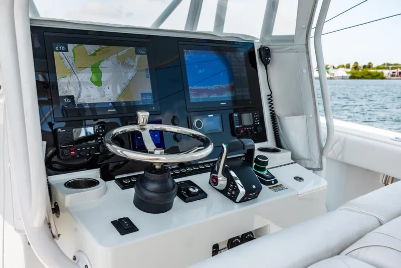 Slide: The Image of Helm of 2024 Freeman 34VH boat with advanced navigation and control systems. - 25