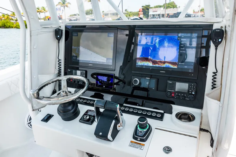 Slide: The Image of Cockpit of 2024 Freeman 34VH boat with advanced navigation and control systems. - 27