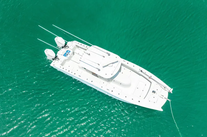 Slide: The Image of Aerial view of 2024 Freeman 34VH boat on turquoise water. - 15