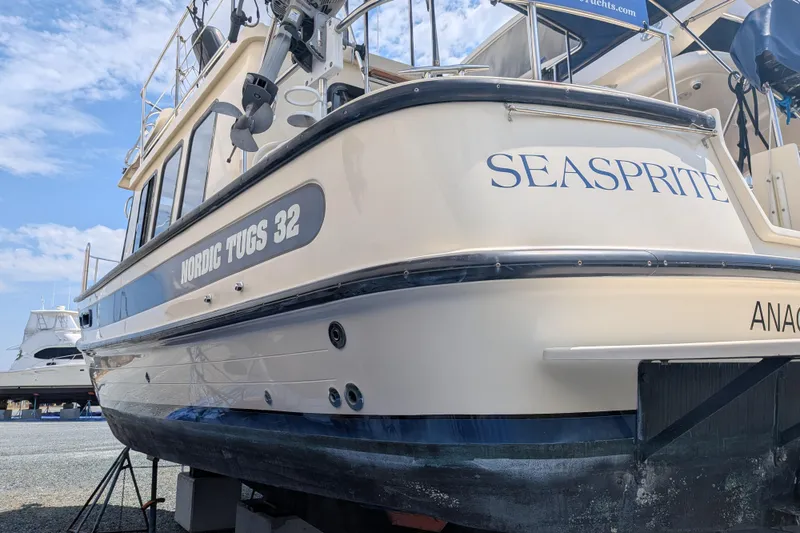 Slide: The Image of 2001 Nordic Tug 32 "Seasprite" boat on dry dock, side view. - 5