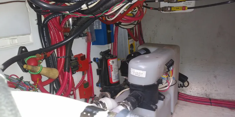 Slide: The Image of Electrical wiring and equipment in the engine room of a 2001 Nordic Tug 32. - 49
