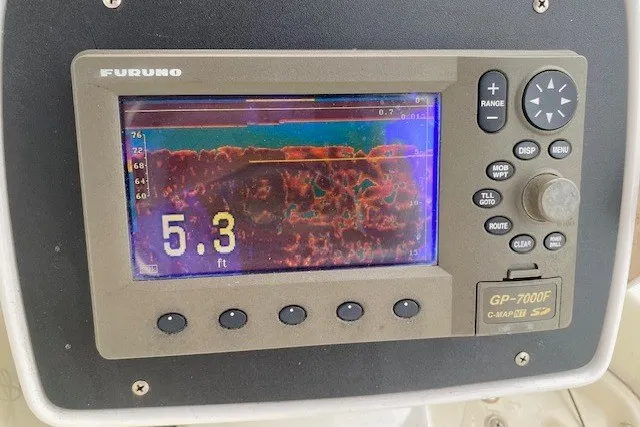 Slide: The Image of Furuno GP-7000F marine GPS depth finder displaying 5.3 feet reading on Hatteras 46 Convertible. - 27