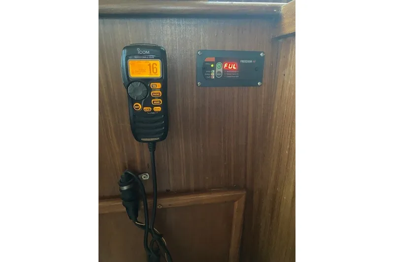 Slide: The Image of ICOM radio and control panel on 1984 Hatteras 46 Convertible yacht interior. - 42