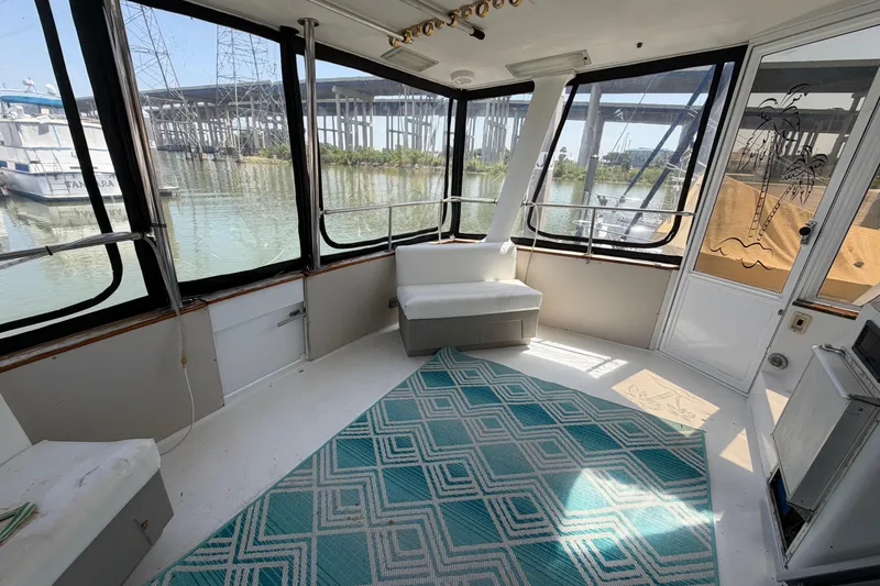 Slide: The Image of Interior of 1989 Trojan International 12 Meter Motor Yacht with scenic water view. - 15