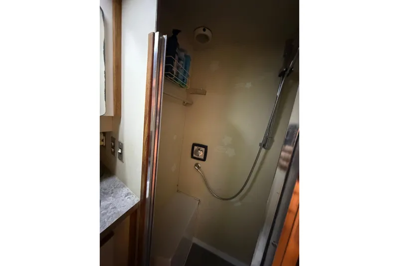 Slide: The Image of Shower area in 1989 Trojan International 12 Meter Motor Yacht bathroom. - 29