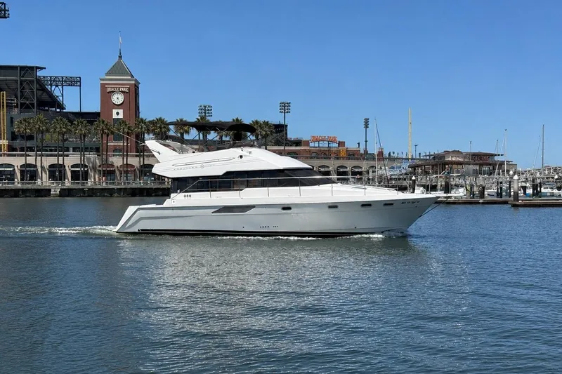 The Image of Bayliner 4388 Motoryacht 1994 cruising near Oracle Park on a sunny day. - 1