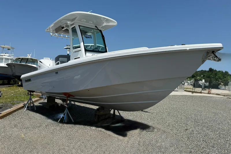 Slide: The Image of 2026 Everglades 253 Center Console boat on display, showcasing sleek design and modern features. - 6