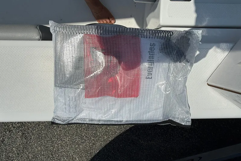 Slide: The Image of Protective mesh bag on Everglades 253 Center Console boat, 2026 model. - 32