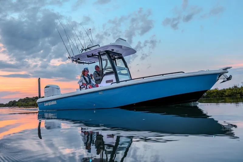 The Image of Manufacturer Provided Image: 2025 Everglades 253 Center Console boat on calm water at sunset. - 0