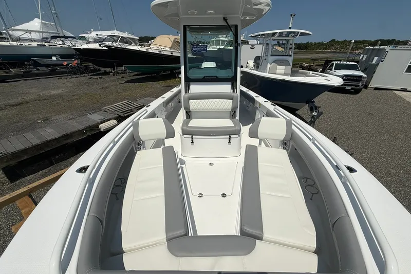 Slide: The Image of 2026 Everglades 253 Center Console boat with spacious seating and modern design. - 28
