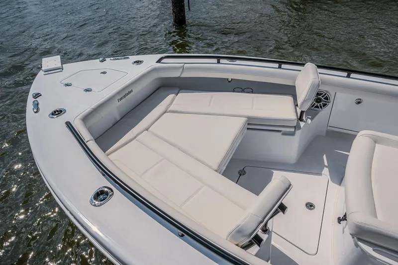 Slide: The Image of Manufacturer Provided Image: 2025 Everglades 253 Center Console boat with spacious seating on calm water. - 4