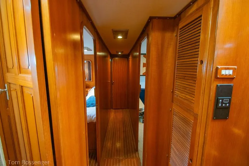 Slide: The Image of Interior hallway of 1990 Kha Shing Flush Deck Motor Yacht with wooden paneling. - 32