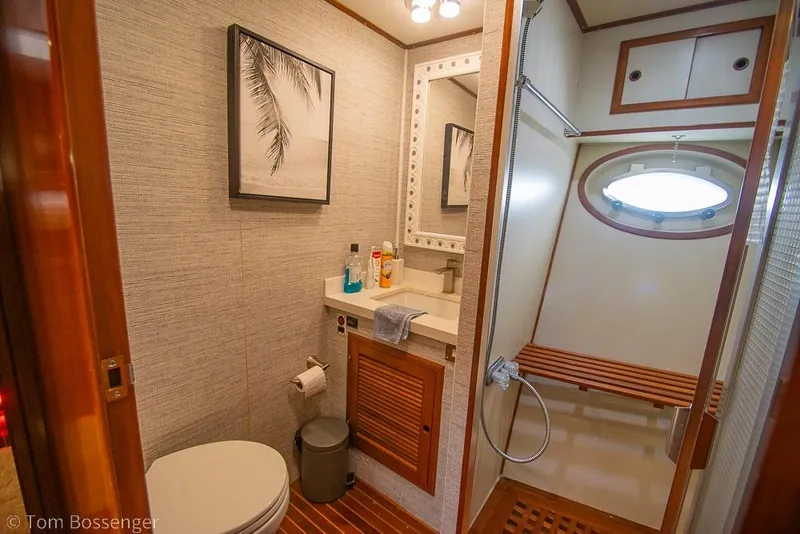 Slide: The Image of Luxurious 1990 Kha Shing Flush Deck Motor Yacht bathroom with modern amenities and elegant design. - 31