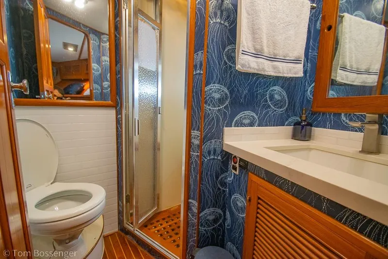 Slide: The Image of Bathroom interior of 1990 Kha Shing Flush Deck Motor Yacht with nautical decor. - 29