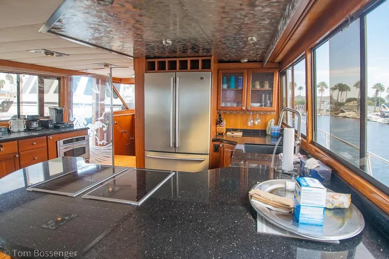 Slide: The Image of Luxurious kitchen interior of a 1990 Kha Shing Flush Deck Motor Yacht. - 5