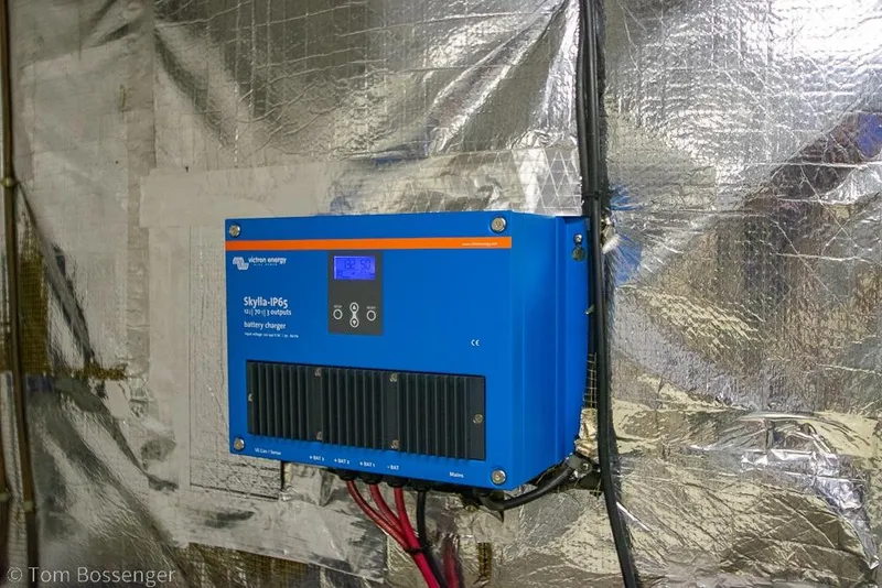 Slide: The Image of Victron Energy Skylla-IP65 battery charger installed on a 1990 Kha Shing Flush Deck Motor Yacht. - 68