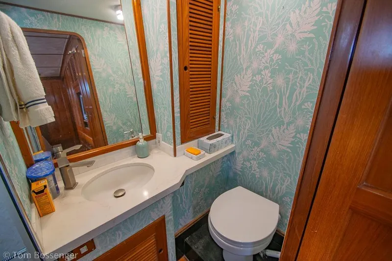 Slide: The Image of Bathroom interior of 1990 Kha Shing Flush Deck Motor Yacht with floral wallpaper. - 22