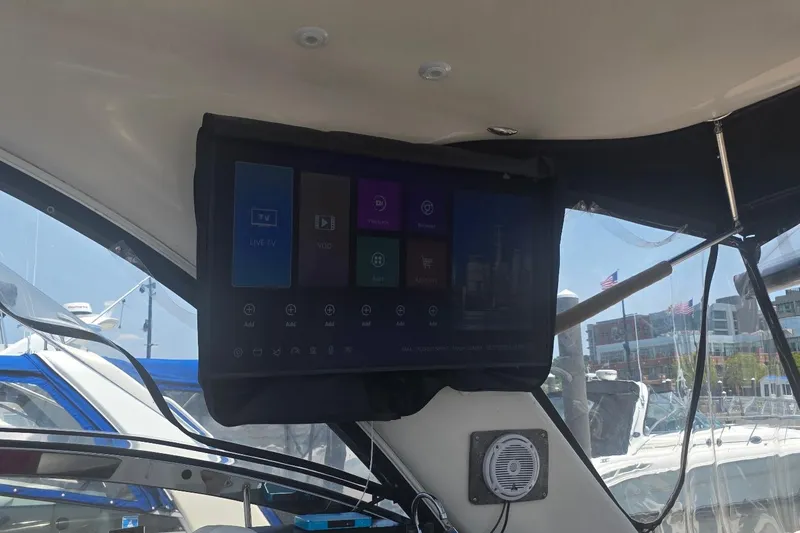 Slide: The Image of Interior of a 2005 Regal Commodore 4060 yacht with a mounted digital screen. - 15