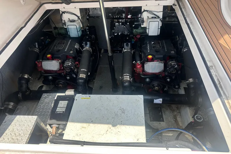 Slide: The Image of Engine compartment of a 2005 Regal Commodore 4060 boat with dual Volvo Penta engines. - 34
