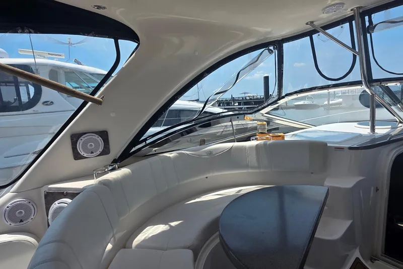 Slide: The Image of Luxurious interior of 2005 Regal Commodore 4060 yacht with plush seating and sleek design. - 10