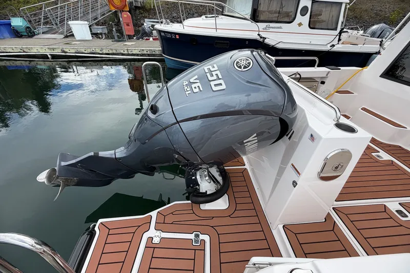 Slide: The Image of 2023 Ranger Tugs R-25 with Yamaha V6 250 outboard engine at dock. - 5