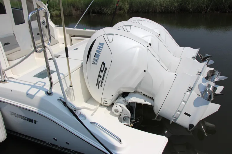 Slide: The Image of 2024 Pursuit OS 405 Offshore boat with Yamaha XTO Offshore engines. - 8