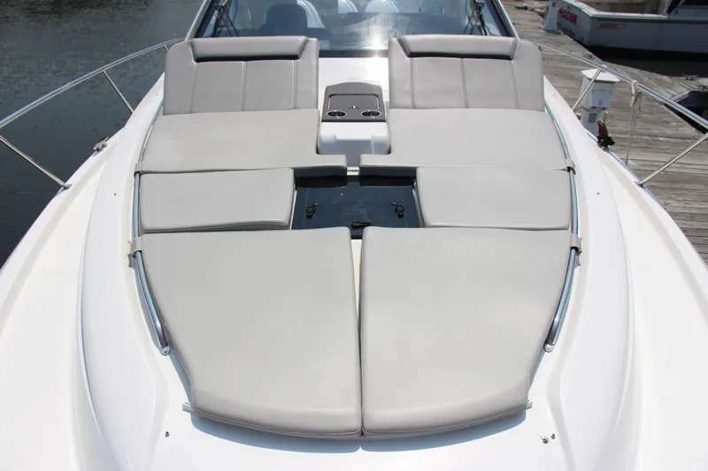 Slide: The Image of 2024 Pursuit OS 405 Offshore boat with spacious sunbathing deck and sleek design. - 20