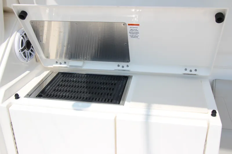 Slide: The Image of Outdoor grill on 2024 Pursuit OS 405 Offshore boat, featuring sleek design and functionality. - 9