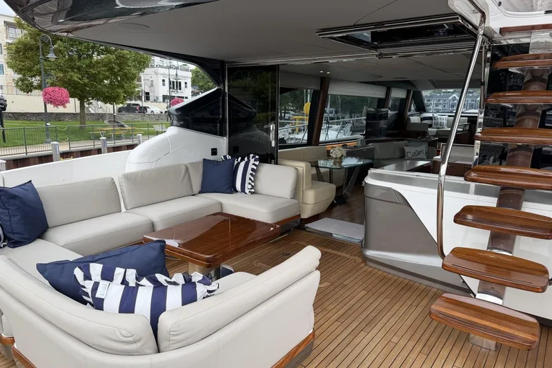 Slide: The Image of Luxurious 2020 Princess S78 yacht interior with elegant seating and wooden accents. - 11