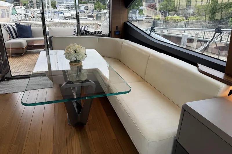 Slide: The Image of Luxurious interior of 2020 Princess S78 yacht with elegant glass table and white seating. - 43