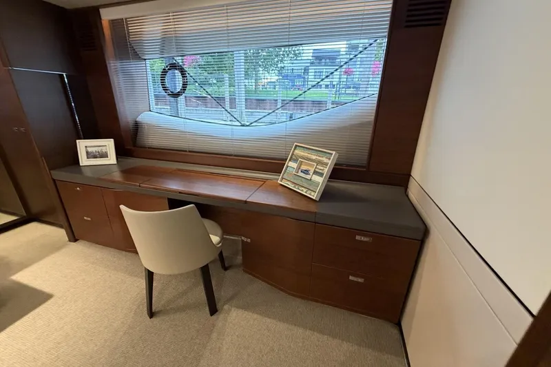 Slide: The Image of Luxurious interior of 2020 Princess S78 yacht with elegant desk and chair setup. - 55