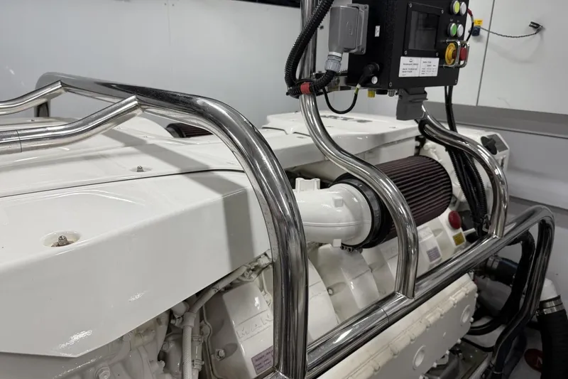 Slide: The Image of Engine room of a 2020 Princess S78 yacht with control panel and chrome railings. - 91